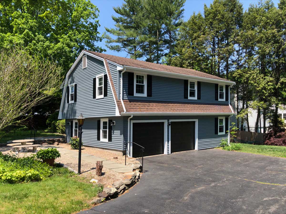 Vinyl siding before and after — J.T. Burke and Sons project in Connecticut