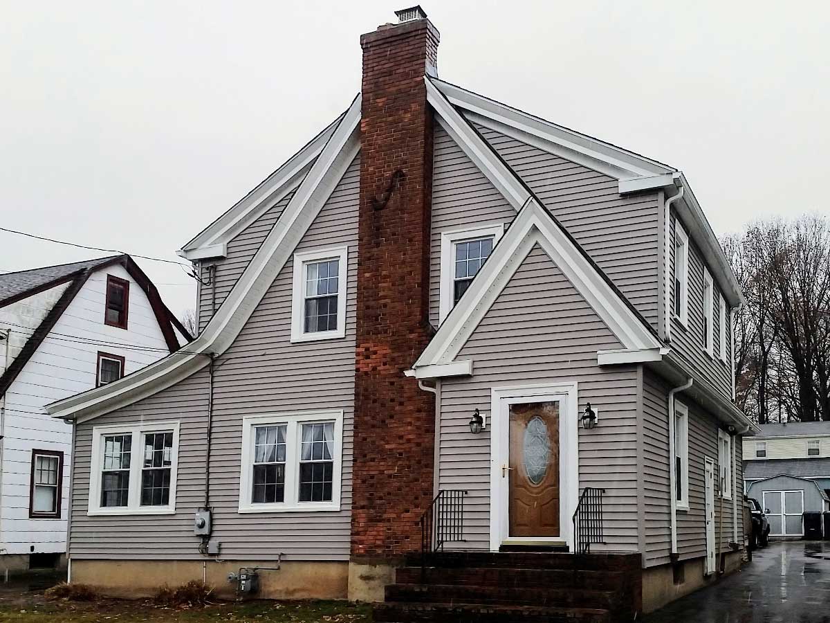 Vinyl siding project completed by J.T. Burke & Sons — Connecticut home exterior transformation